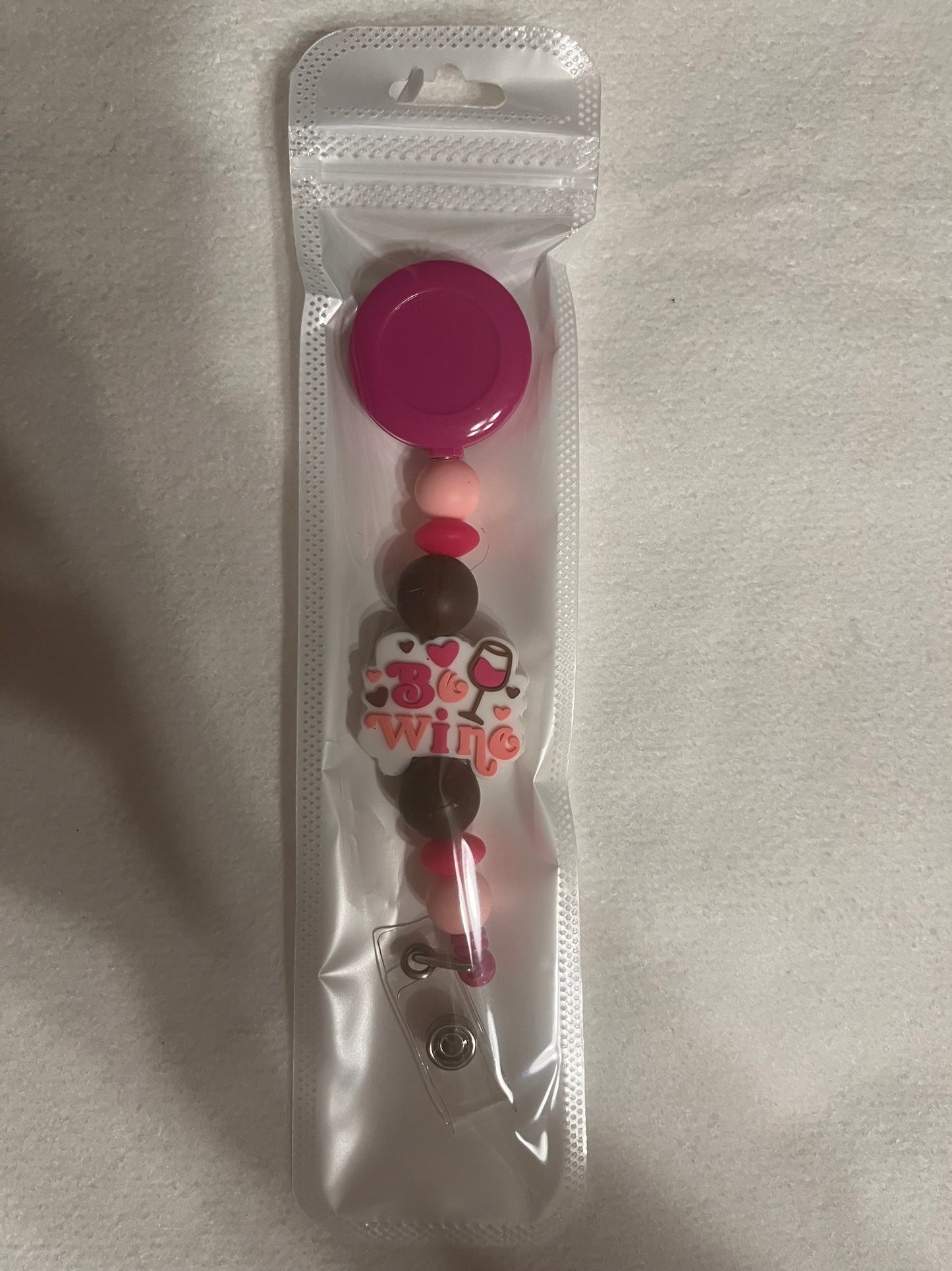 BEADED BADGE REELS