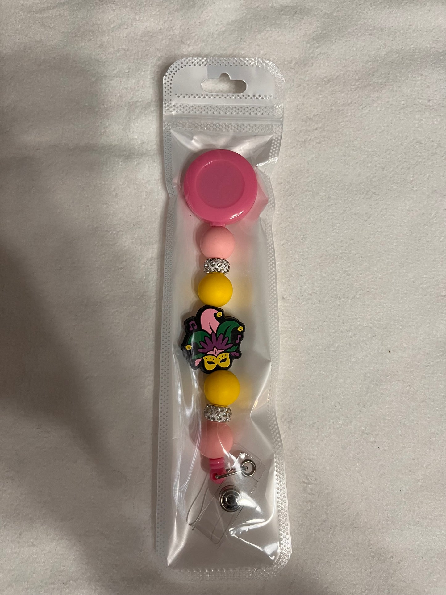BEADED BADGE REELS