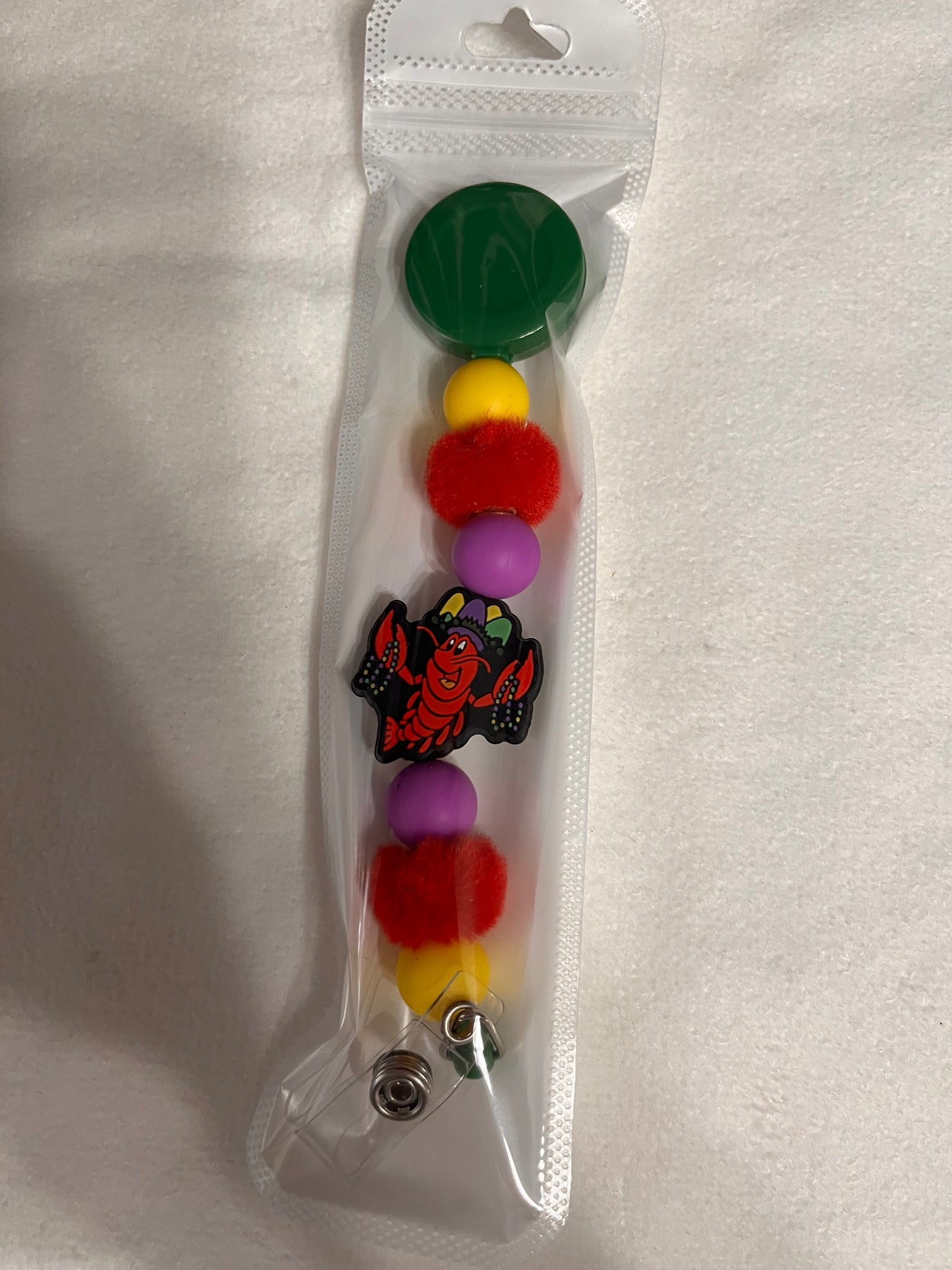 BEADED BADGE REELS